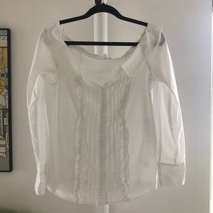White ruffled blouse